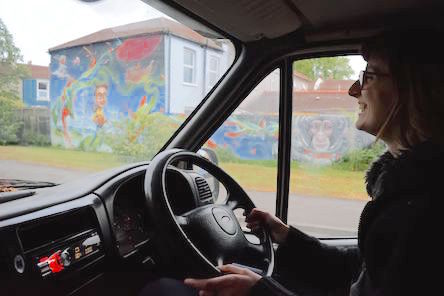 Vandweller at the wheel of her vehicle